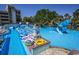 Lazy river style pool with waterslide and plenty of lounge chairs at `1207 S Ocean Blvd. # 51512, Myrtle Beach, SC 29577