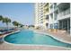Resort-style pool with plenty of lounge chairs at 2701 S Ocean Blvd. # 1410, North Myrtle Beach, SC 29582