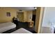 Two beds, small table, kitchenette and balcony at 2701 S Ocean Blvd. # 1410, North Myrtle Beach, SC 29582