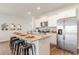 Modern kitchen with white cabinets, granite countertops, and stainless steel appliances at 1080 Flintshire Dr., Myrtle Beach, SC 29579