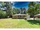 Brick ranch home with a front porch and attached garage at 553 Martin Luther King Rd., Pawleys Island, SC 29585