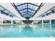 Indoor pool with a central fountain and plenty of natural light at 1501 S Ocean Blvd. # 904, Myrtle Beach, SC 29577
