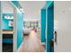 Bright entryway with light wood floors and blue walls at 1501 S Ocean Blvd. # 904, Myrtle Beach, SC 29577