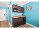 Small kitchenette with microwave, sink, and mini-fridge at 1501 S Ocean Blvd. # 904, Myrtle Beach, SC 29577
