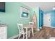 Small dining area with a round table and two chairs at 1501 S Ocean Blvd. # 904, Myrtle Beach, SC 29577