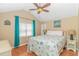 Spacious bedroom with a queen bed and light decor at 6001- 1029 S Kings Hwy., Myrtle Beach, SC 29575