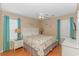 Cozy bedroom with a queen-size bed and beach-themed decor at 6001- 1029 S Kings Hwy., Myrtle Beach, SC 29575