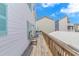 Wooden deck with teal shutters and seating at 6001- 1029 S Kings Hwy., Myrtle Beach, SC 29575