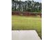 Landscaped backyard with grassy area and patio at 4085-D Taranto Loop # 4604-D, Myrtle Beach, SC 29579