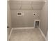 Convenient laundry room with tile flooring and shelving at 4089-B Taranto Loop # 4702-B, Myrtle Beach, SC 29579