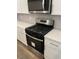 Stainless steel gas range and microwave in a modern kitchen at 4089-B Taranto Loop # 4702-B, Myrtle Beach, SC 29579