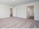 Spacious bedroom with carpeting and access to bathroom at 355 Jeff Waters Circle, Longs, SC 29568