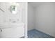 Small bathroom with vanity and blue tile floor at 800 9Th Ave. S # T-4, North Myrtle Beach, SC 29582