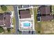 Overhead view of a community pool, surrounded by residential buildings at 800 9Th Ave. S # T-4, North Myrtle Beach, SC 29582