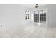 Bright dining room with tile floor and access to backyard patio at 800 9Th Ave. S # T-4, North Myrtle Beach, SC 29582