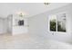 Dining area with tile floors, kitchen pass-through, and window at 800 9Th Ave. S # T-4, North Myrtle Beach, SC 29582