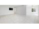 Spacious living room with tile floors and plenty of natural light at 800 9Th Ave. S # T-4, North Myrtle Beach, SC 29582