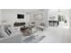 Open living room with tile floors, dining area, and modern furniture at 800 9Th Ave. S # T-4, North Myrtle Beach, SC 29582