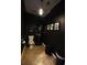 Dark-themed bathroom with modern vanity, toilet, and stylish wall art at 3564 Saint James Ave. # A B, Myrtle Beach, SC 29577