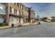 Brick townhouses with black shutters and a quaint street scene at 3564 Saint James Ave. # A B, Myrtle Beach, SC 29577