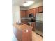 Kitchen with stainless steel appliances and an island at 3564 Saint James Ave. # A B, Myrtle Beach, SC 29577