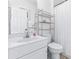 Small bathroom with white vanity, toilet, and shower at 204 24Th Ave. N, North Myrtle Beach, SC 29582