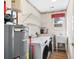 Laundry room with washer, dryer, shelving, and utility sink at 723 Antigua Dr., Myrtle Beach, SC 29572