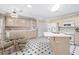 Kitchen with light wood cabinets, an island, and a breakfast nook at 723 Antigua Dr., Myrtle Beach, SC 29572