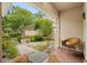Relaxing patio area with wicker furniture and access to yard at 723 Antigua Dr., Myrtle Beach, SC 29572