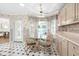 Breakfast area with glass table and chairs overlooking the pool at 723 Antigua Dr., Myrtle Beach, SC 29572