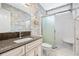Small bathroom with granite countertop and a walk-in shower at 723 Antigua Dr., Myrtle Beach, SC 29572