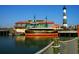 Waterfront restaurant Margaritaville with lighthouse backdrop at 537 Honeyhill Loop, Conway, SC 29526