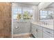 Bathroom with updated vanity and shower/tub combo at 619 Springs Ave., Pawleys Island, SC 29585