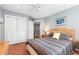 Well-lit bedroom featuring a queen-size bed and built-in closet at 619 Springs Ave., Pawleys Island, SC 29585