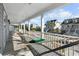 Front porch with hammock, offering a relaxing ocean view at 619 Springs Ave., Pawleys Island, SC 29585