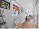 Long hallway with wood flooring and access to sunroom at 619 Springs Ave., Pawleys Island, SC 29585