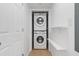 Stackable washer and dryer with additional shelving at 2151 Bridgeview Ct. # 3501, North Myrtle Beach, SC 29582