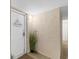 Building entrance with a white door and potted plant at 2151 Bridgeview Ct. # 3501, North Myrtle Beach, SC 29582