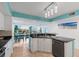 Modern kitchen with white cabinets, granite countertops and stainless steel appliances at 2151 Bridgeview Ct. # 3501, North Myrtle Beach, SC 29582