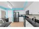 Modern kitchen with white cabinets, granite countertops, and stainless steel appliances at 2151 Bridgeview Ct. # 3501, North Myrtle Beach, SC 29582