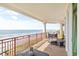 Spacious balcony overlooking the ocean with outdoor seating at 122 Vista Del Mar Ln. # 2-302, Myrtle Beach, SC 29572