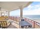 Relaxing balcony with ocean views and comfortable seating for outdoor enjoyment at 122 Vista Del Mar Ln. # 2-302, Myrtle Beach, SC 29572