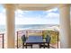 Stunning oceanfront balcony featuring a table and chairs for enjoying the view at 122 Vista Del Mar Ln. # 2-302, Myrtle Beach, SC 29572