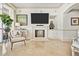 Living room with fireplace, large TV and comfortable seating at 122 Vista Del Mar Ln. # 2-302, Myrtle Beach, SC 29572