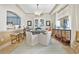 Charming dining area with round table and view into kitchen at 122 Vista Del Mar Ln. # 2-302, Myrtle Beach, SC 29572