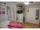 Spacious bedroom with a white dresser and double doors at 1409 Arbor Rd., Loris, SC 29569