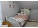 Cozy bedroom with a white bed frame and pink bedding at 1409 Arbor Rd., Loris, SC 29569