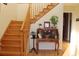 Elegant entryway with hardwood floors, a wooden staircase, and a secretary at 1409 Arbor Rd., Loris, SC 29569