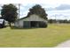 Large barn with green roof and sliding doors at 1409 Arbor Rd., Loris, SC 29569