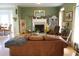 Living room with fireplace and leather sofa at 1409 Arbor Rd., Loris, SC 29569